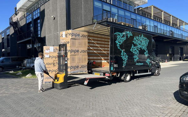 Sustainable luxury getaway in Mauritius delivery truck unloading boxes at Join the Pipe.